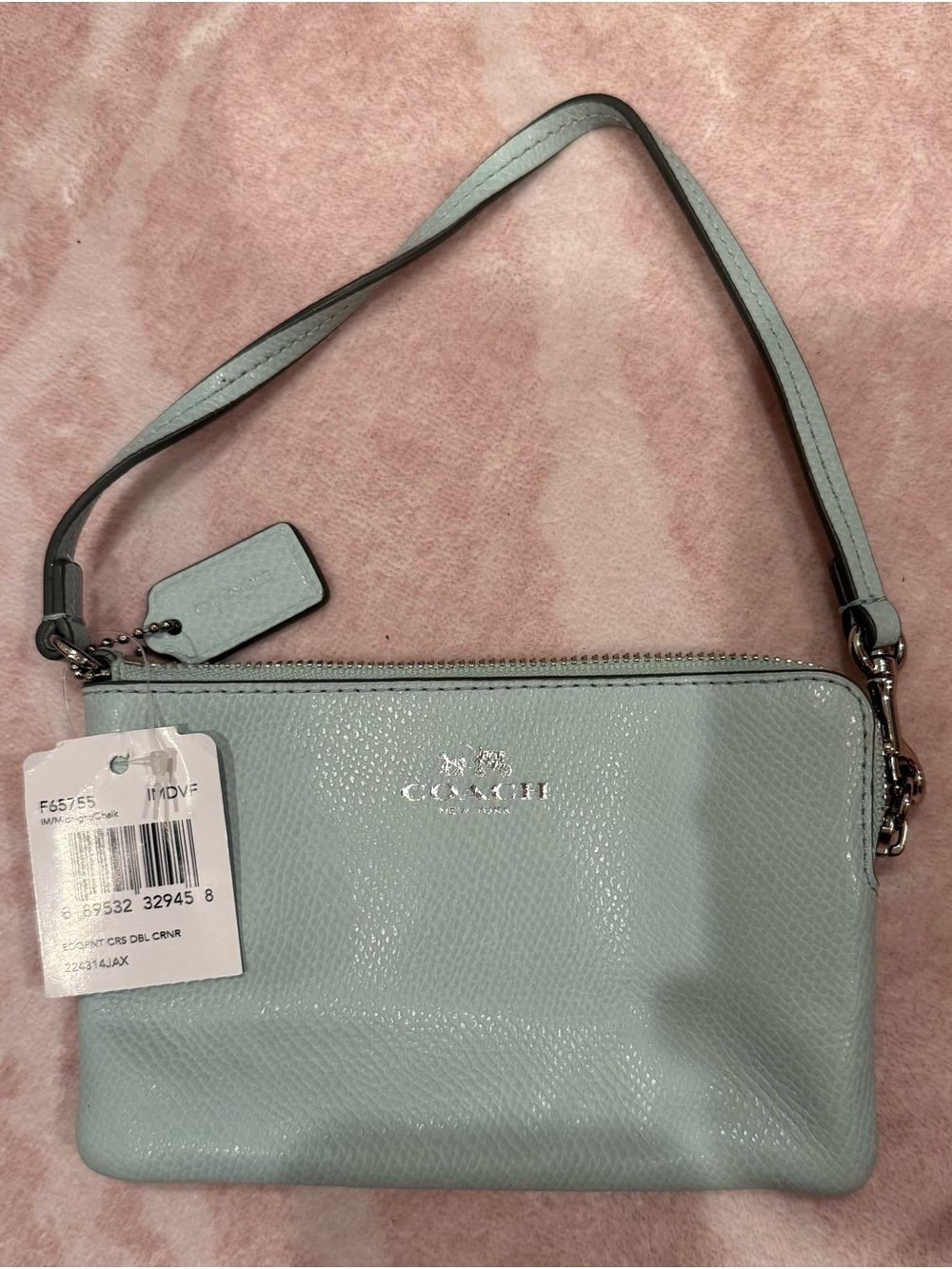 Coach Mint Green Pebbled Leather Wristlet with Silver Hardware